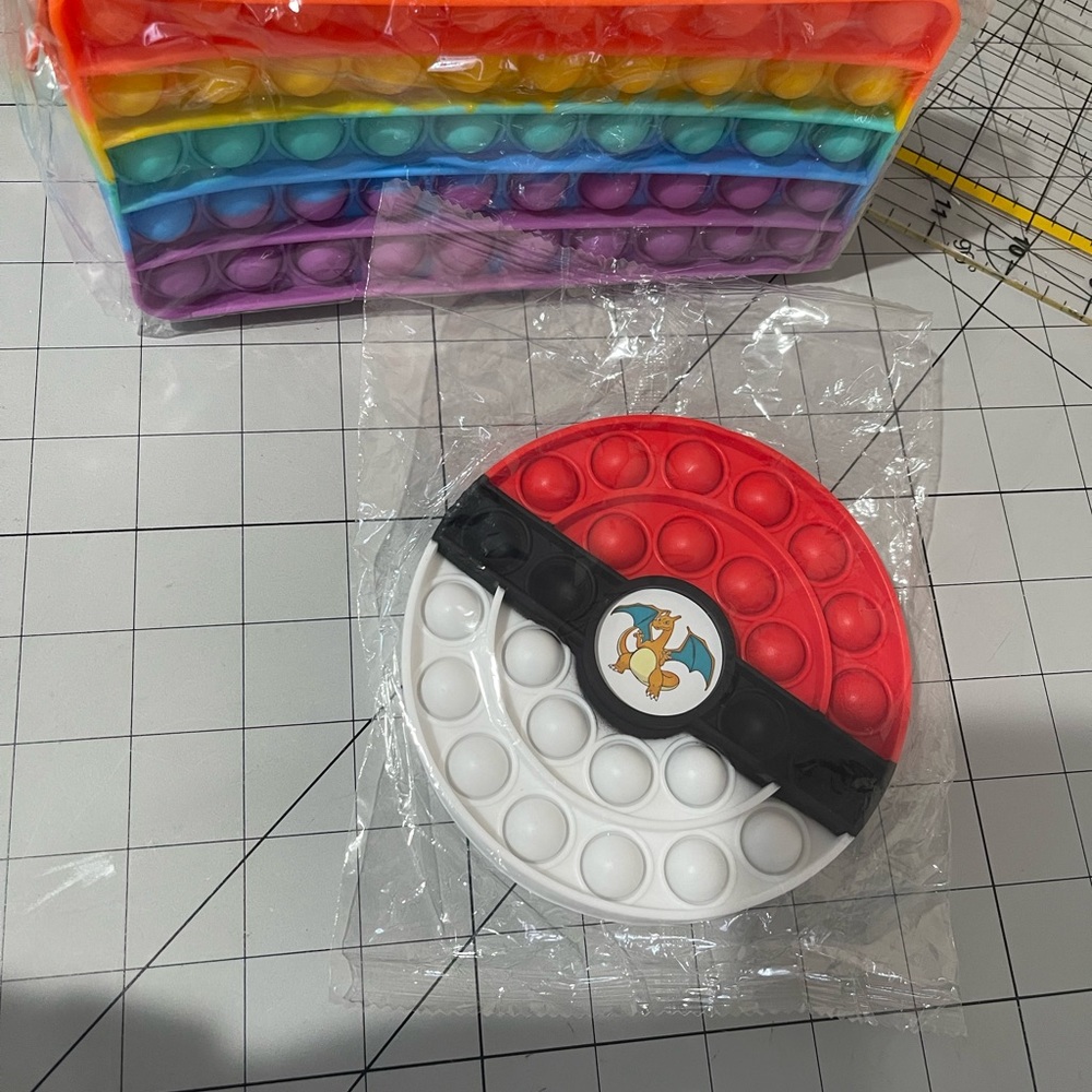 2pc Fidget pop it’s bundle Pokémon character and pencil pouch